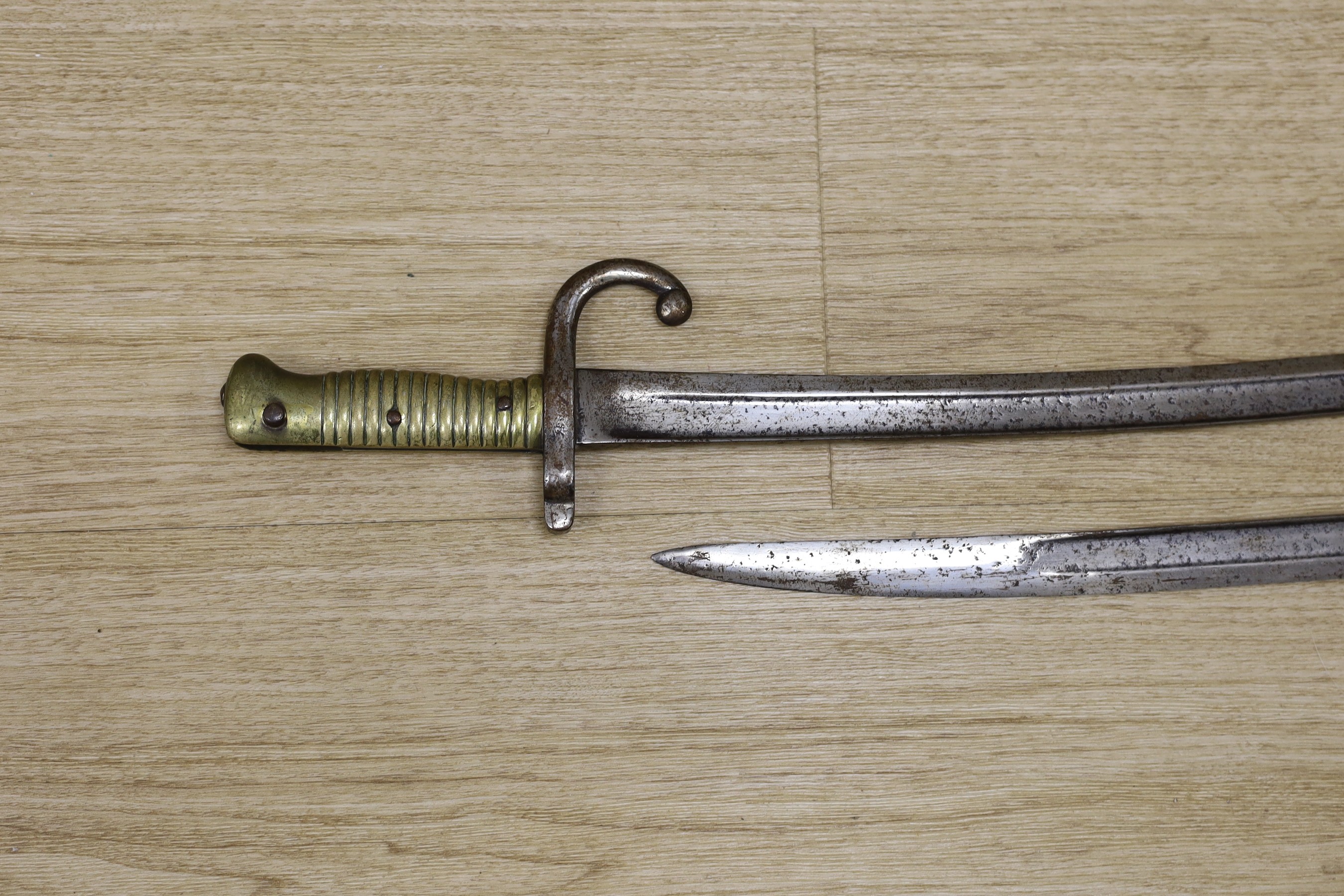 Two 19th century European bayonets, 69cm tall